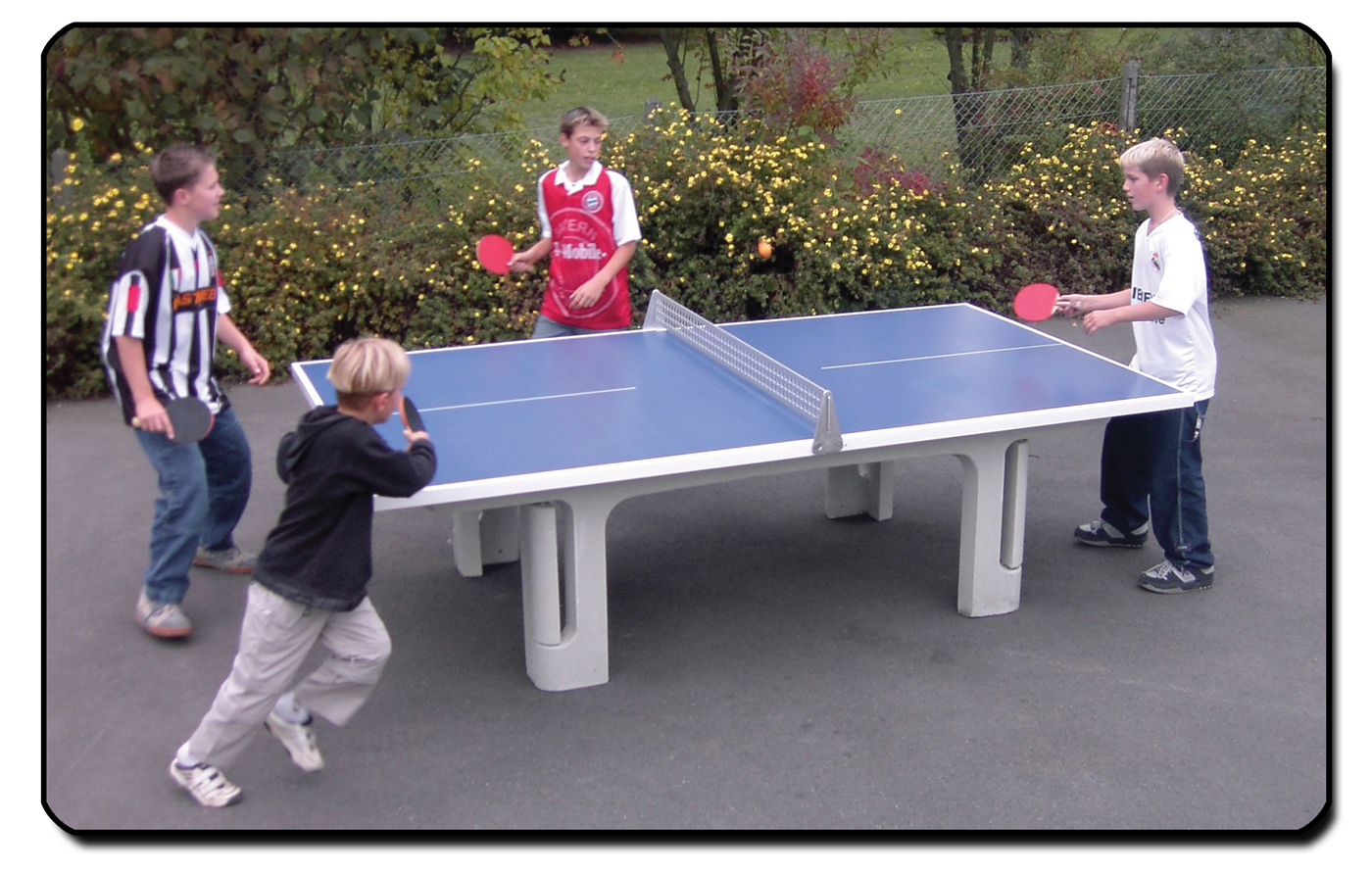 Butterfly Park Concrete table tennis table in use