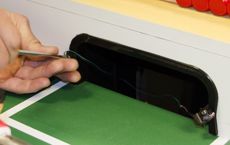 A foosball goal with sensors being fitted