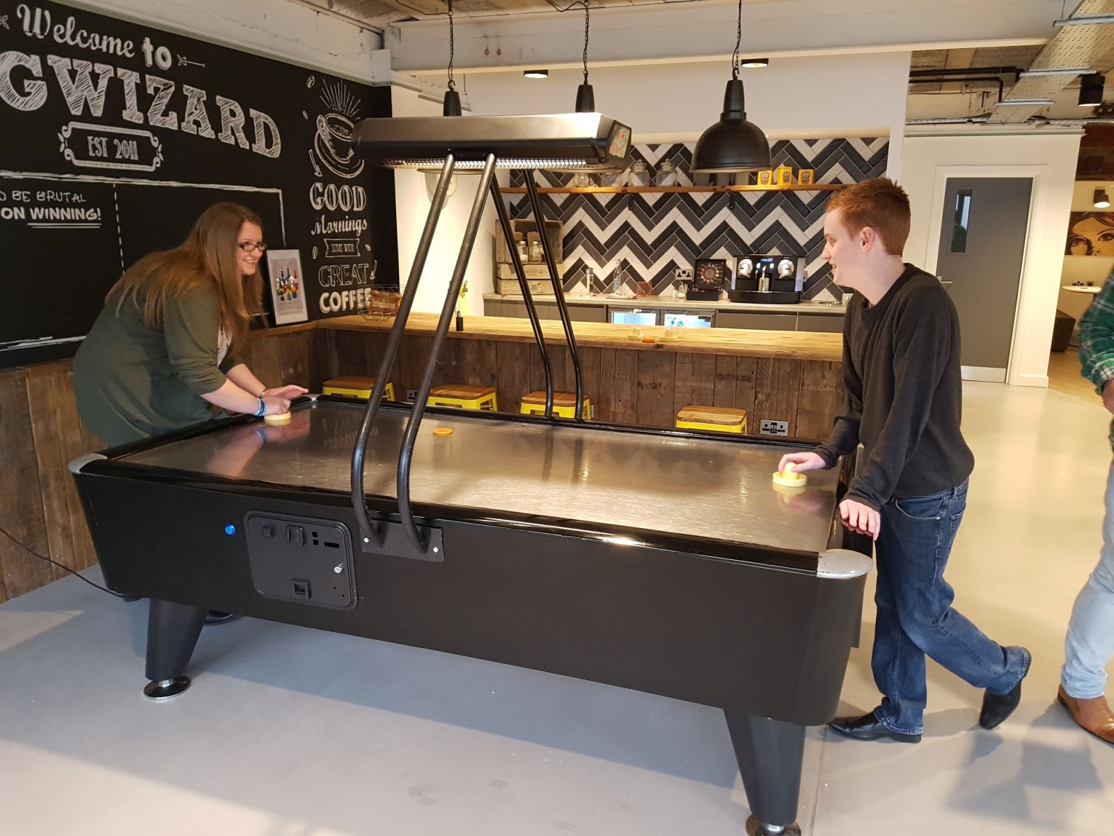 Black reconditioned Fast Track air hockey table