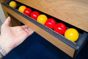 The Classic Diner pool table has a ball drawer