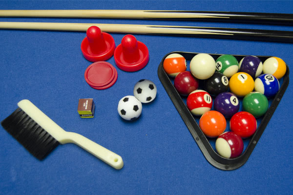 Free pool table accessories supplied with the Trisport