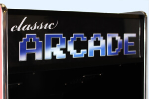 The illuminated arcade sign on the Cosmic arcade.