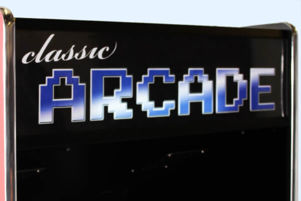 The illuminated arcade sign on the Cosmic arcade.