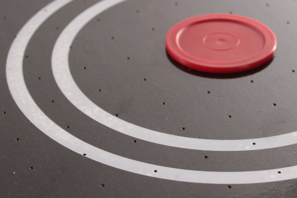 The Tekscore Jet's play surface has thousands of perforations for airflow
