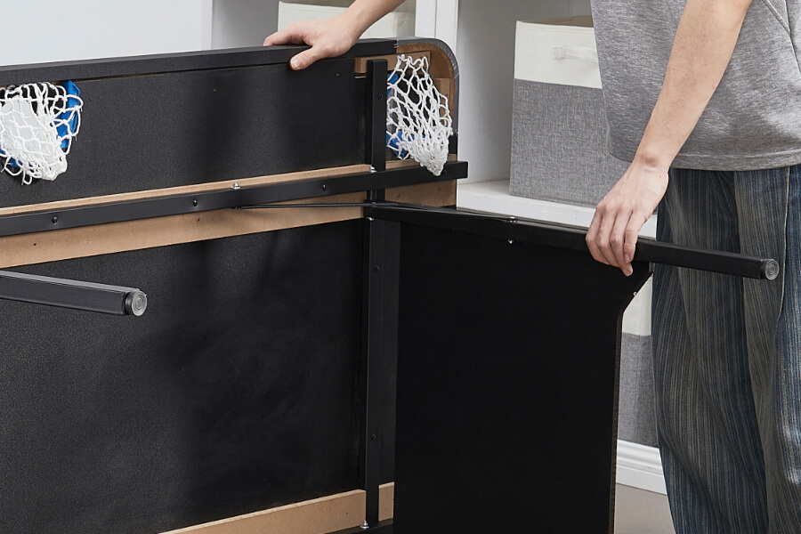 The pool table's folding legs.