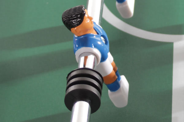 Player figures on the Tekscore have wedge-shaped feet