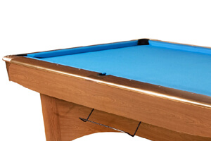 The side of the Dynamic III Slate Bed pool table