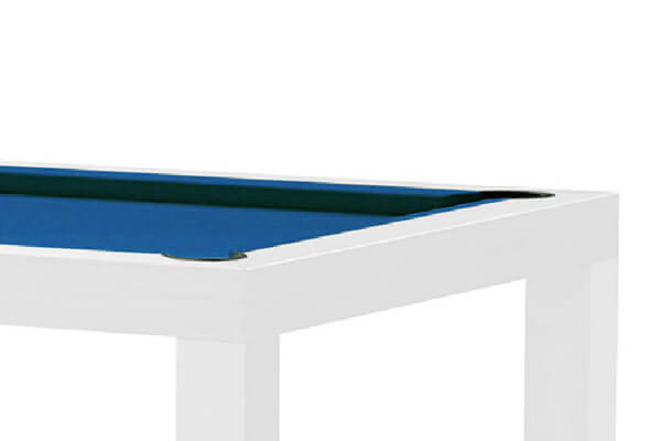 The corner of a white Dynamic Mozart Slate Bed Pool Table