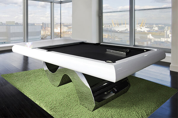 A white Picasso Luxury pool table with black cloth