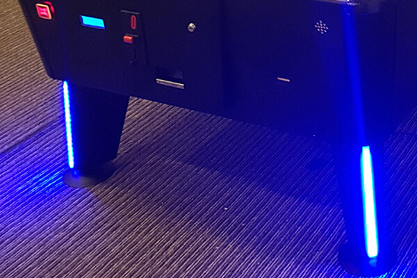 Lights on the WIK Black air hockey table