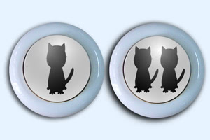 The 1p and 2p buttons on the Mewsmnt Rcade cats arcade machine