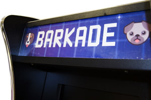 The illuminated marquee on the Barkade arcade machine
