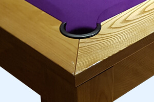 The Precision pool table's real oak surface.