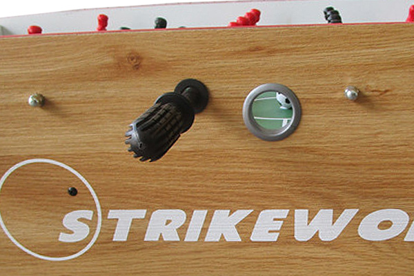 The ball entry port on the Free Kick football table