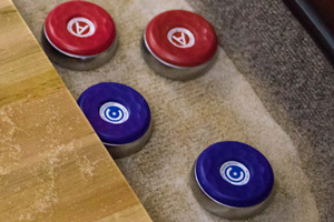 Pucks collected on the Gentry shuffleboard table