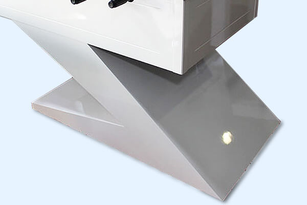 The leg of the Zen football table