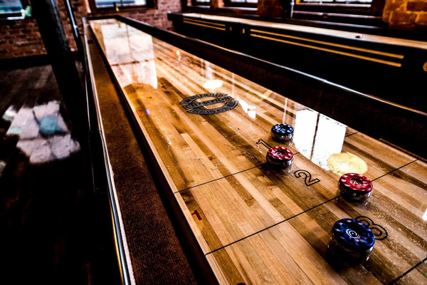 Shuffleboard tables in a trendy bar