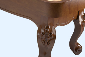 The leg carving on the Scottsdale shuffleboard table