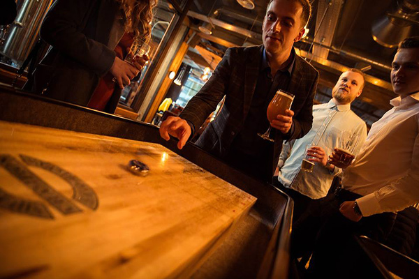 Shuffleboard game in a bar