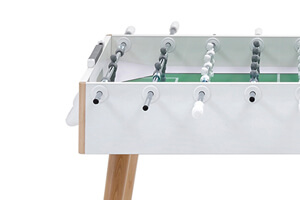 The side of a white FAS Flamingo football table