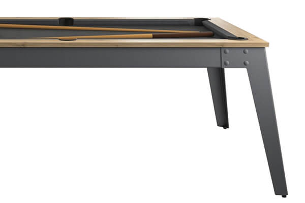 The legs of a Steel slate bed pool table