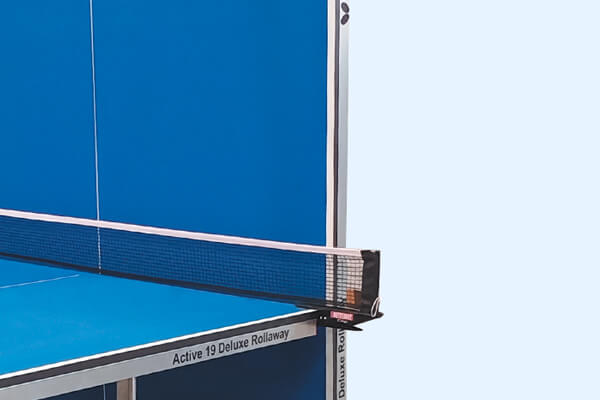 A half folded Butterfly Active 19 Deluxe Rollaway Tennis Table
