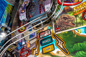 A close up shot of the playfield on a Stern Jurassic Park LE pinball machine