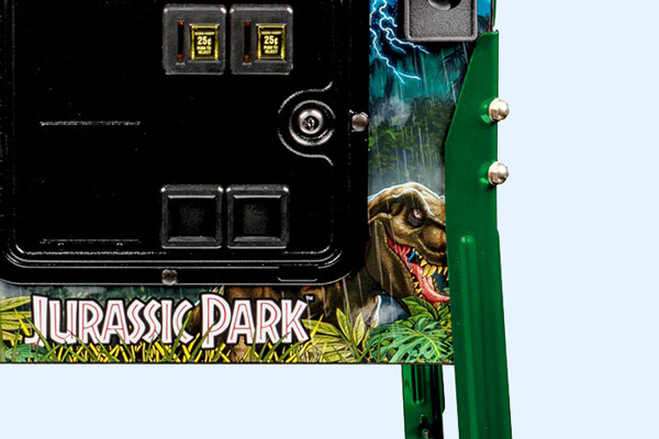 The coin mech on the Stern Jurassic Park LE pinball machine