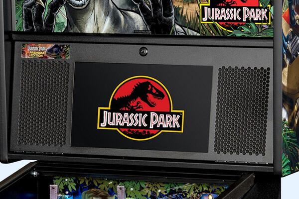 The LCD screen and speakers on the Stern Jurassic Park Premium pinball machine