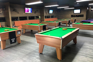 The Blackball pool table in black.