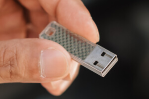 A USB stick used for loading games onto an AtGames Gamer Mini.