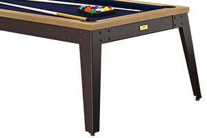 The pocket of a vintage snooker table.