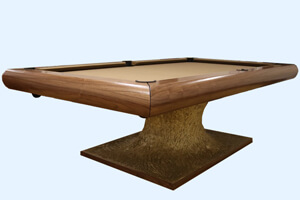 The Volcano pool table in a room.