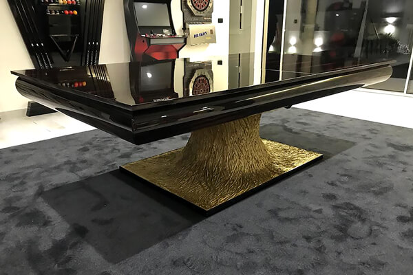 The Volcano slate bed pool table with top in glossy black.