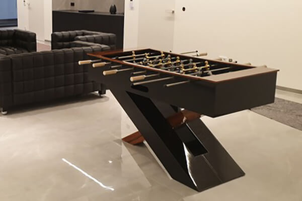 The Olympus Football Table in a room.