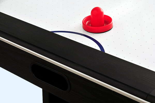 Sure Shot Competition Air Hockey pusher and playing surface.