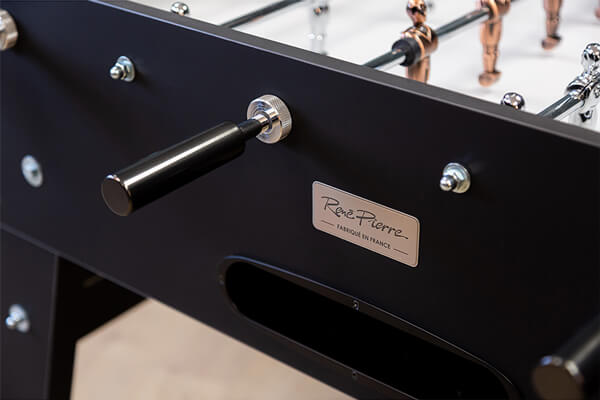 The Rene Pierre Baby-foot Onyx football table handles.