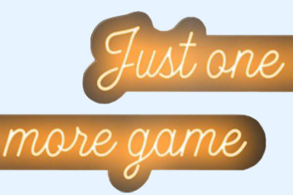 The Just One More Game Neon sign.