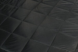 The quilted material of the Tekno cover.