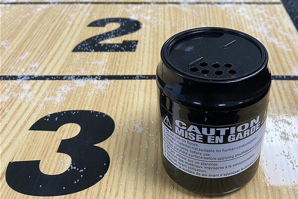 A tube of shuffleboard powder.