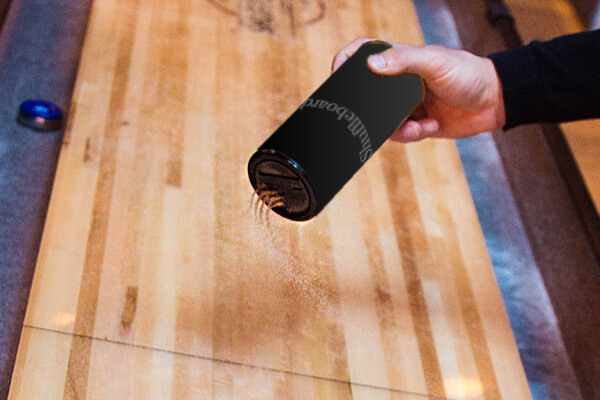 A tube of shuffleboard powder.