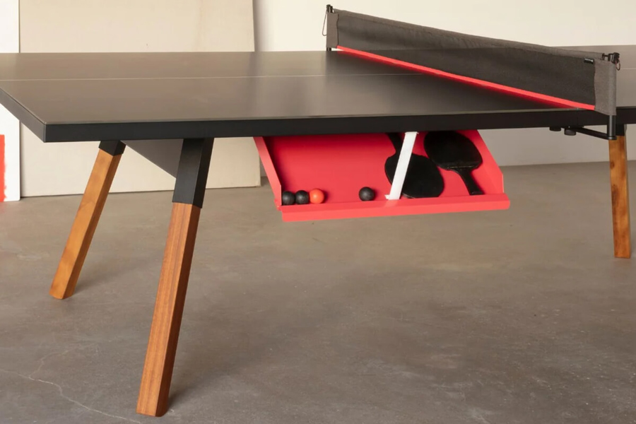 The ball and accessory storage drawer.