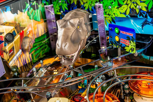The pinball Jurassic Park 30th anniversary playfield features.