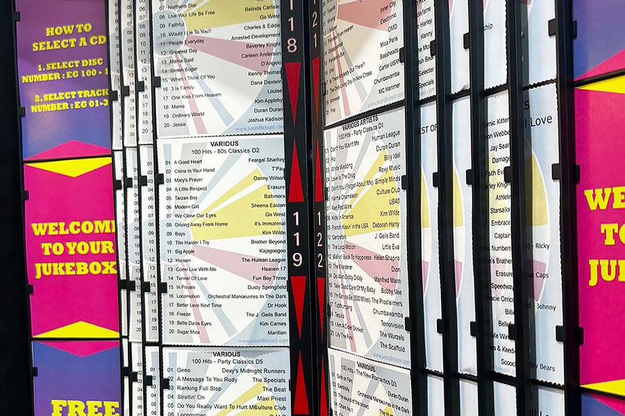 The Sound Leisure Remix-50 CD Wall-mounted jukebox song labels.