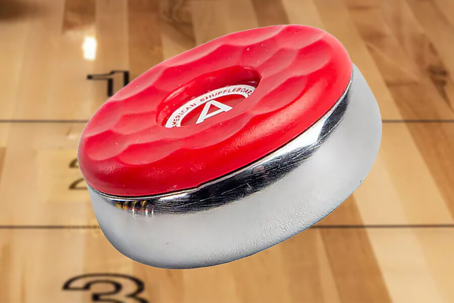 The Sun-glo Shuffleboard American red Puck.