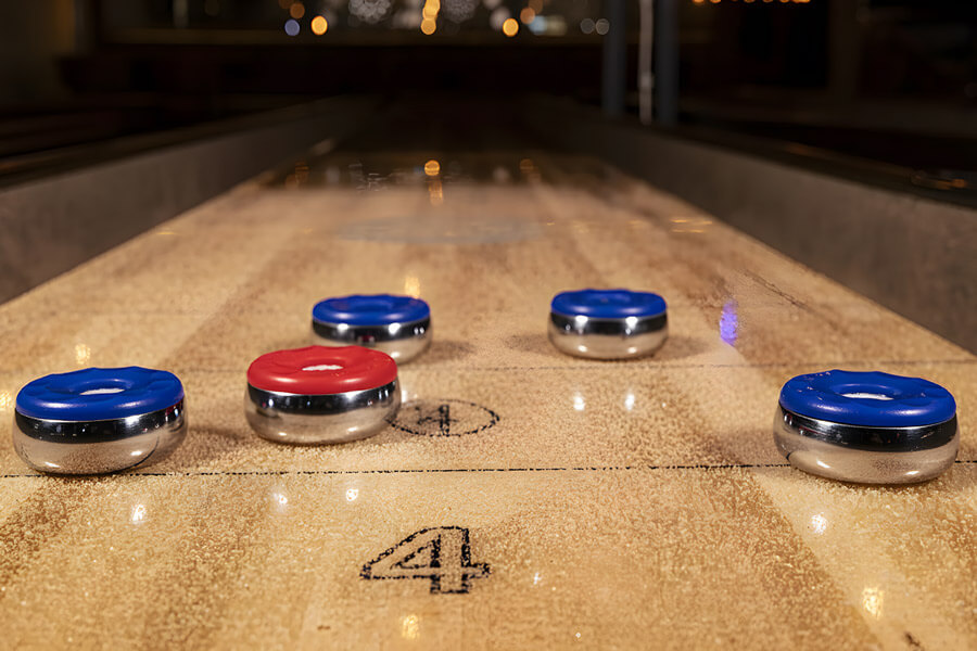 The Sun-glo Shuffleboard American large weights.