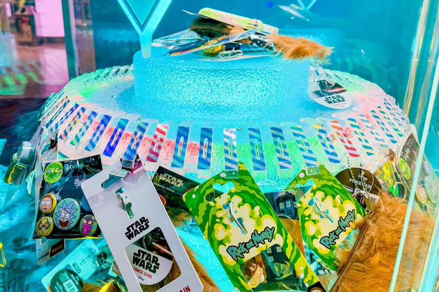 The Win Fall Revolution arcade machine in blue close up.