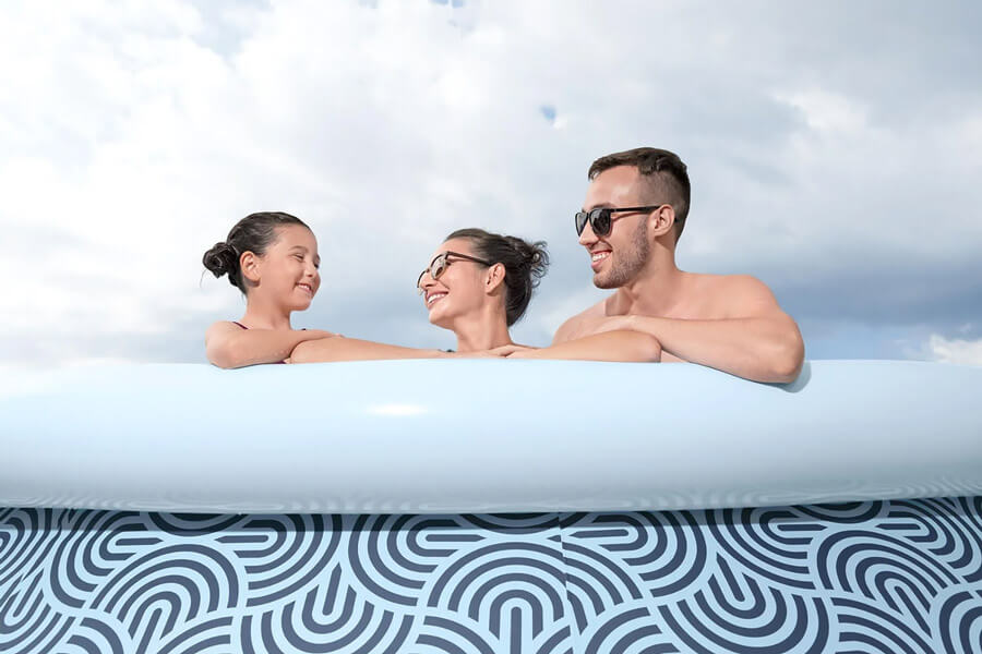 Family Enjoying the Rattan Fast Set Pool Set.