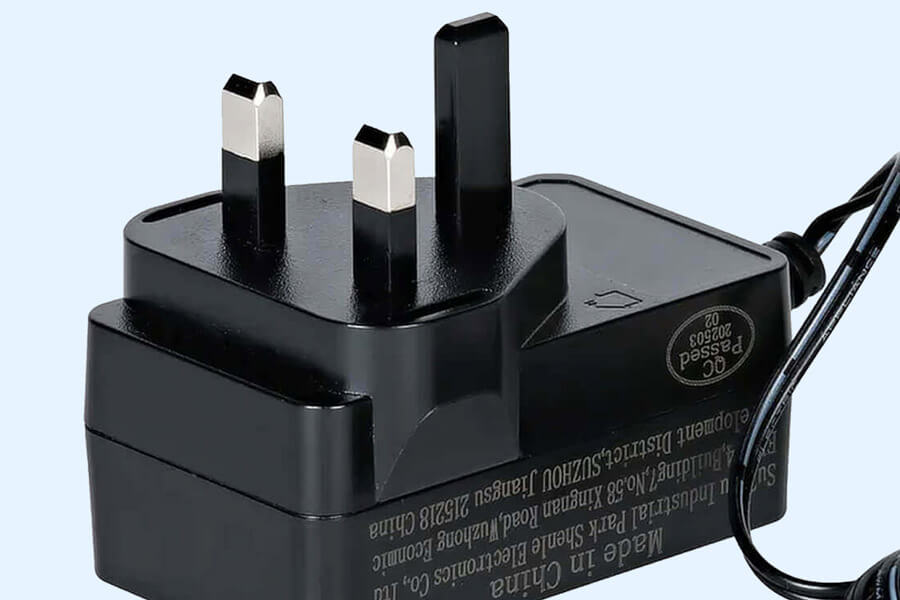 The Peg Perego Lithium 12V Battery Charger close up.