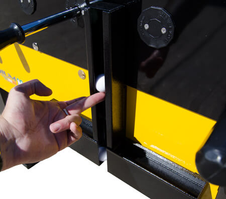 The ball loading chute on the Stadium VS commercial football table.